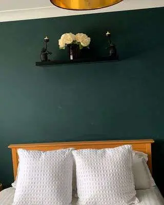 green black and white bedroom 