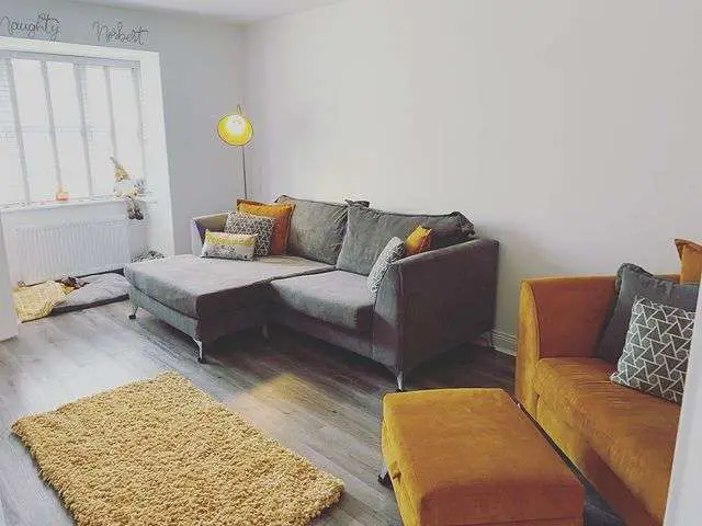 modern grey and mustard living room